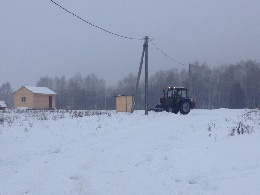 Очистка дорог от снега в дачном поселке Красный Стан