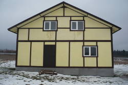 Двухэтажный деревянный дом 9х9м